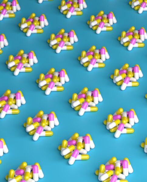 lots of pills on a blue background